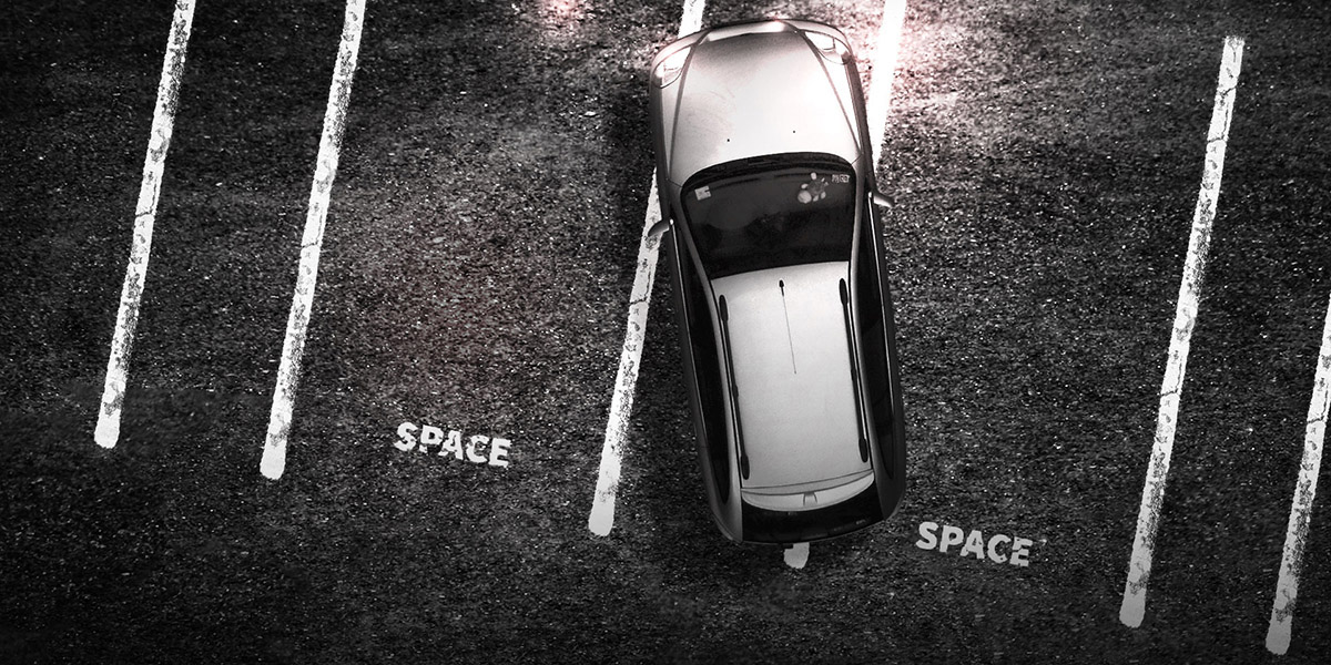 Car badly parked between Space Space
